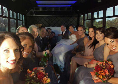 Large wedding party in bus