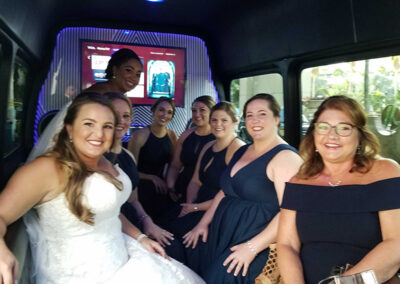 Group of women with bride on party bus